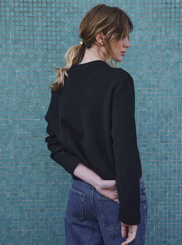 maille élégante pour mi-saison veste armelle noire