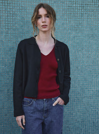 veste armelle noire allure moderne minimaliste femme