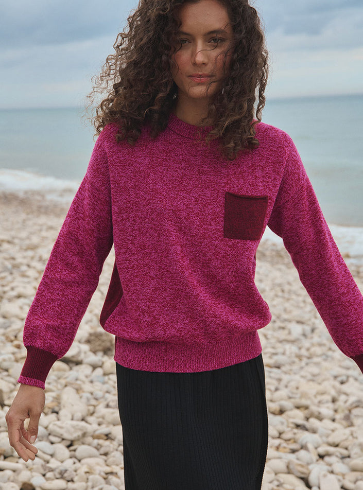 Pull Eva en laine mérinos rose mouliné avec poche contrastée vue face